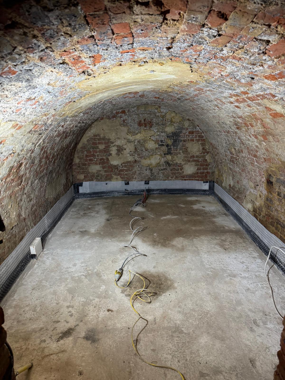 Existing vaulted cellar during assessment and preparation
