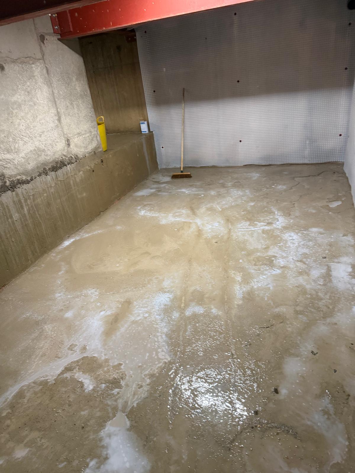 Basement floor prepared before the next installation stage