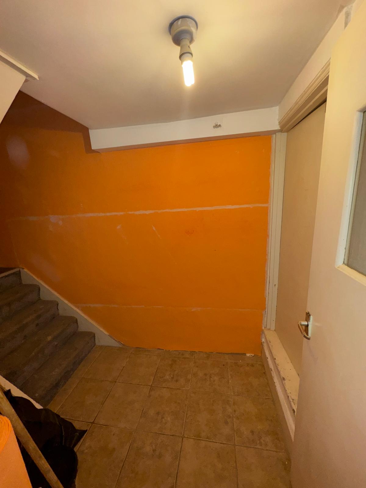 Damp-proofing treatment applied to an internal wall