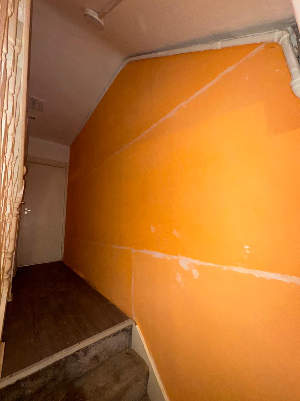 Internal wall during damp-proofing treatment