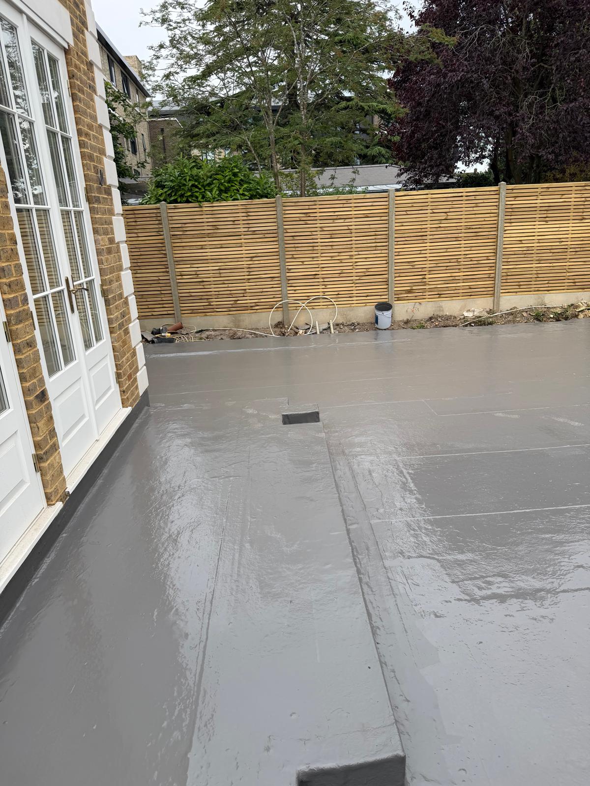Completed deck waterproofing around the property edges